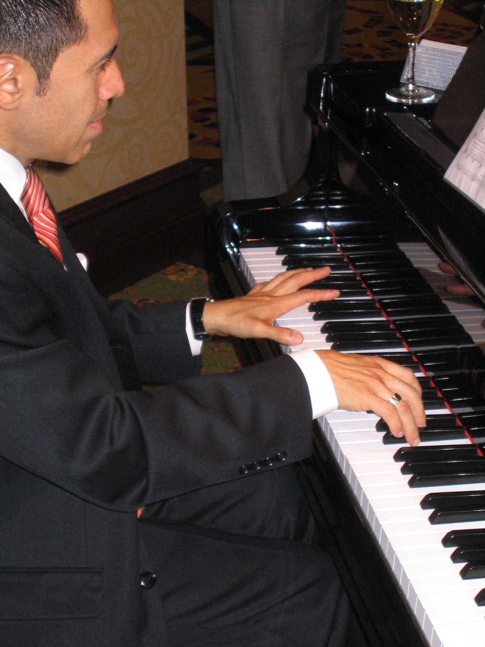 Aaron with hands on keyboard in San
                        Francisco